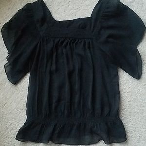 Fun sheer top with Spanish flair